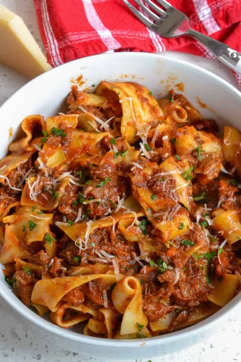 Shredded beef ragu in a bowl.