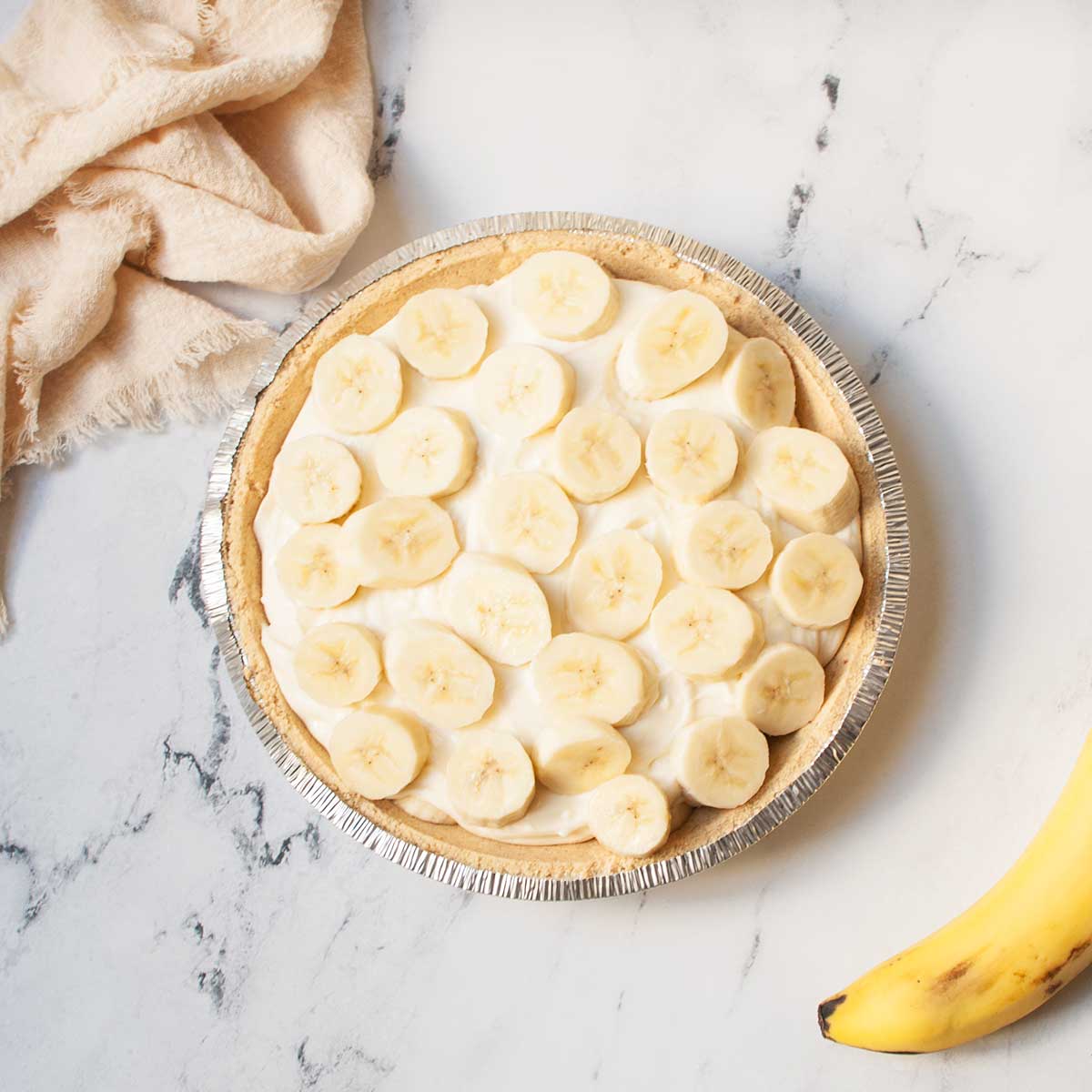 Overhead shot of whole banana breeze pie.