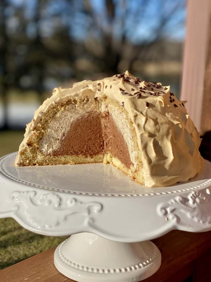 Zuccotto, Italian dessert cake, on a cake display.