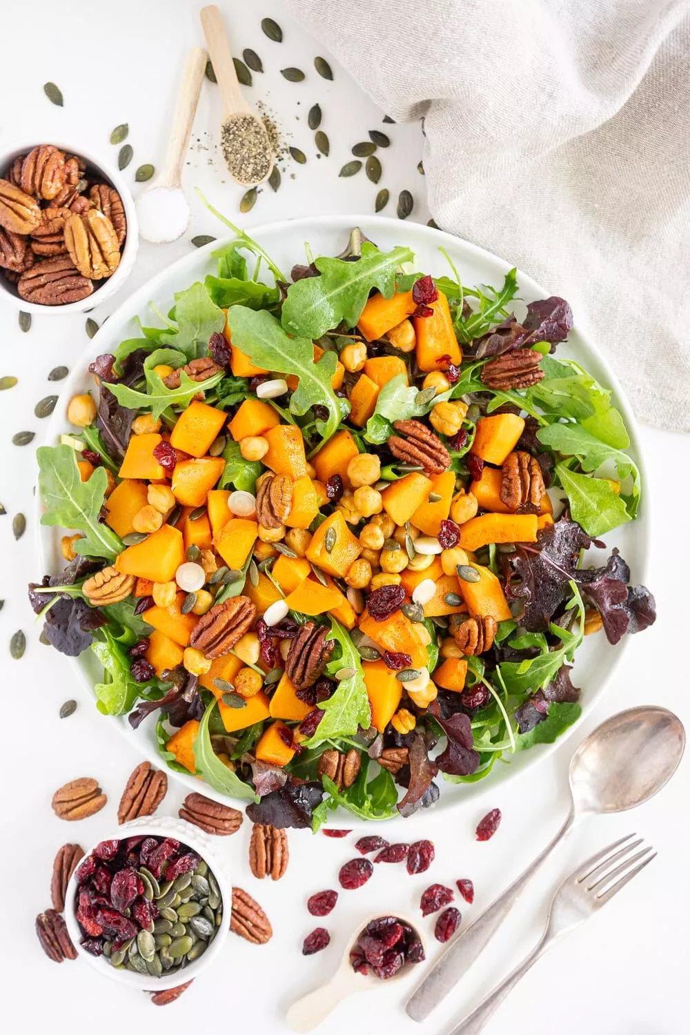Roasted butternut squash salad with pecans and dried cranberries.