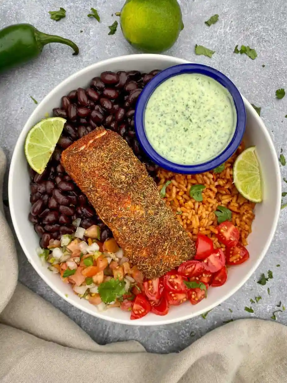 Blackened salmon bowl recipe with creamy jalapeno salsa.