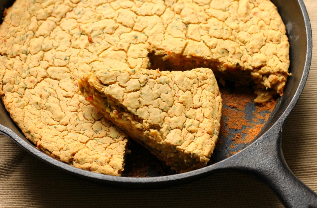 Syrian red lentil bread in a cast iron pan.