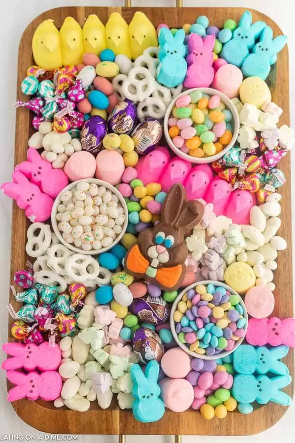 Easter candy charcuterie board with an assortment of candies.