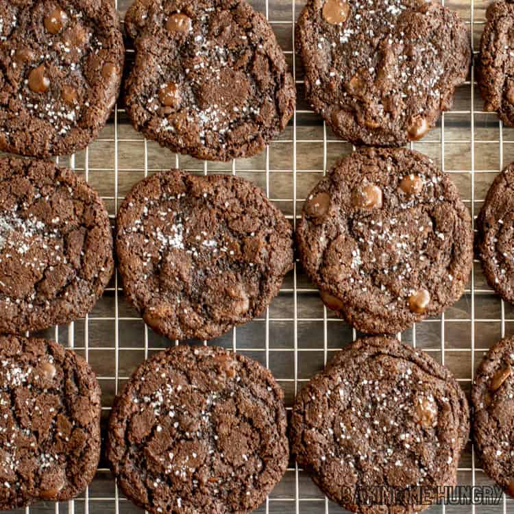 Salted brownie cookies on a cooling rack.