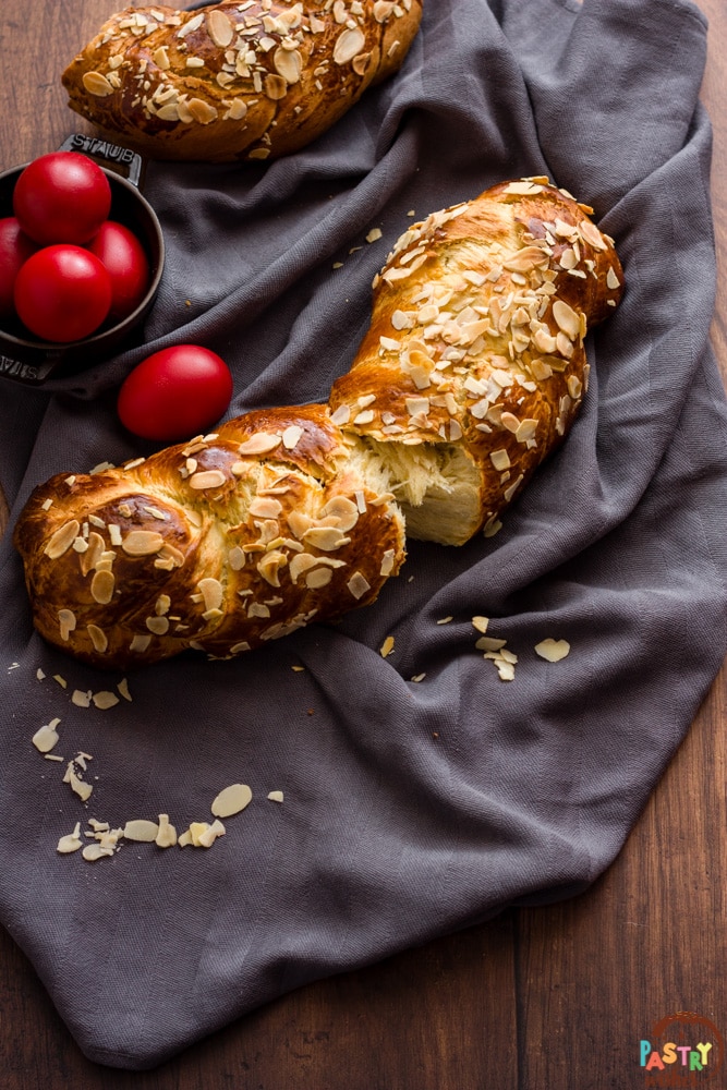 Traditional Greek Easter bread on a dark gray cloth.