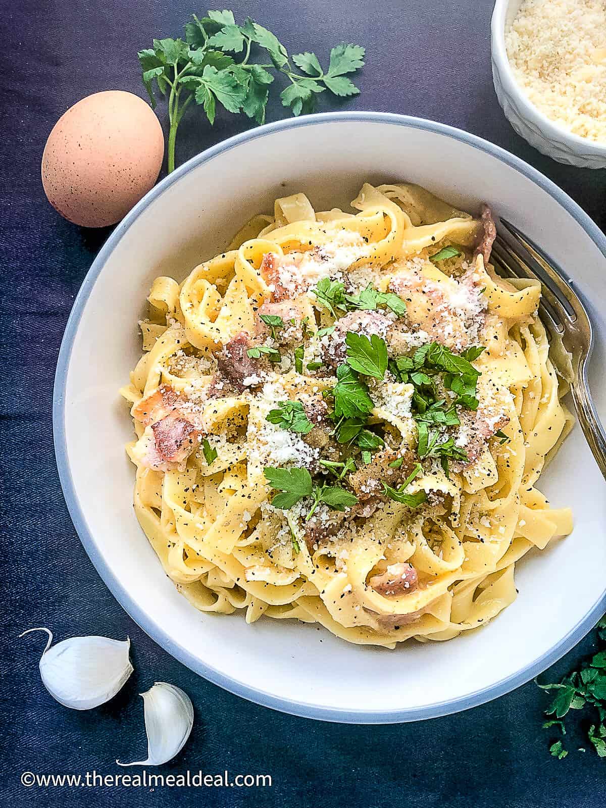 Tagliatelle carbonara in a bowl.