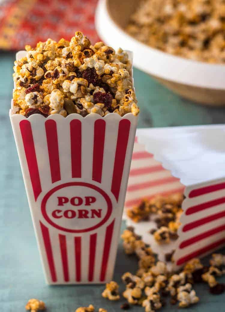 Sweet tajin popcorn in a decorative container.