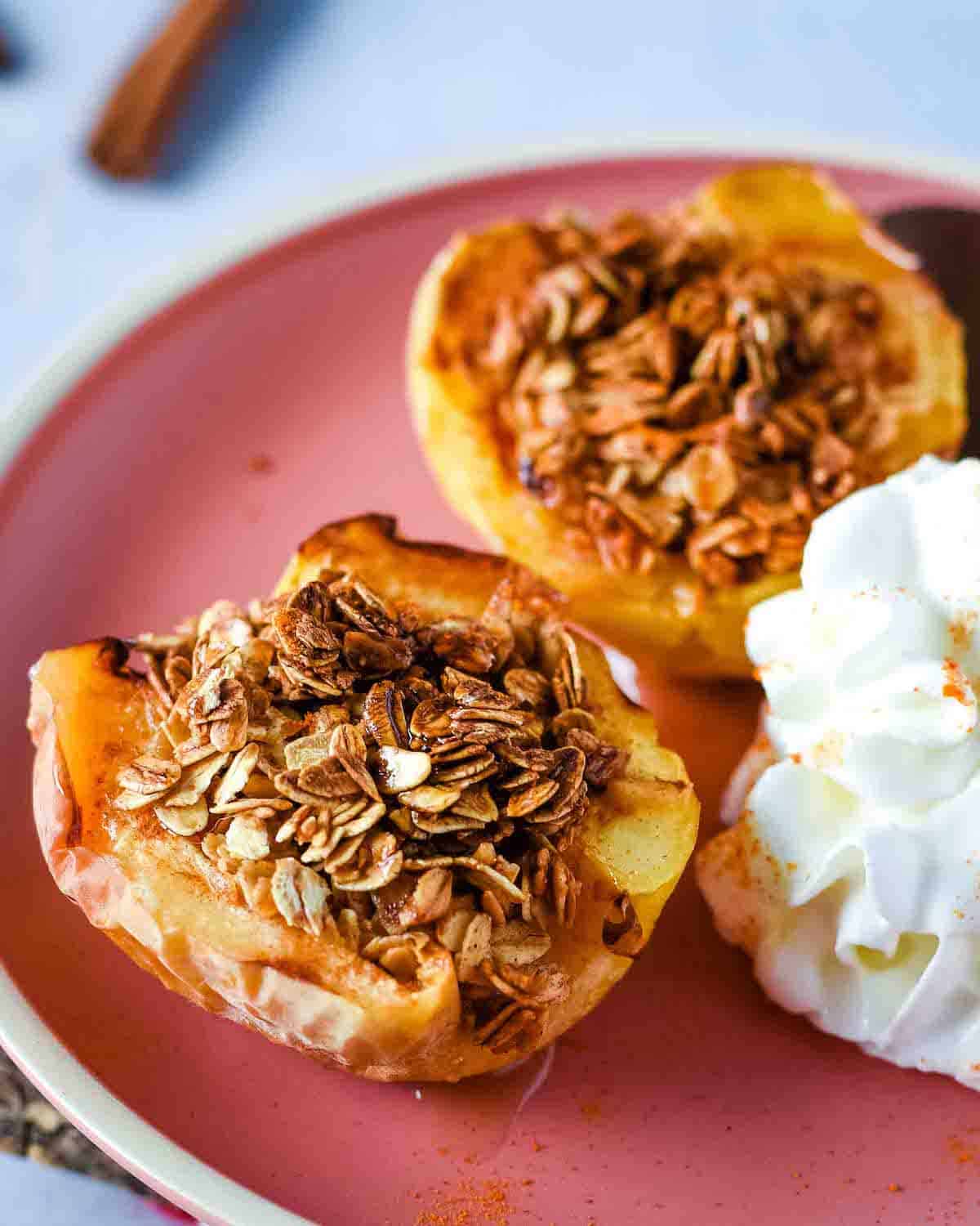 Easy air fryer baked apples on a pink plate.