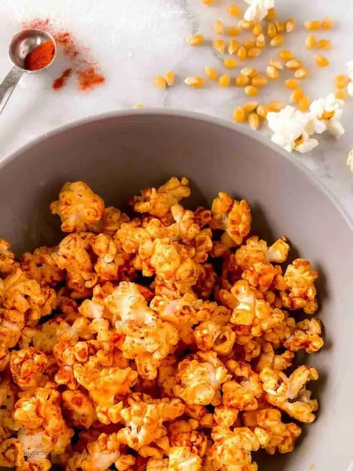 Kashmiri chili and cheese popcorn in a bowl.