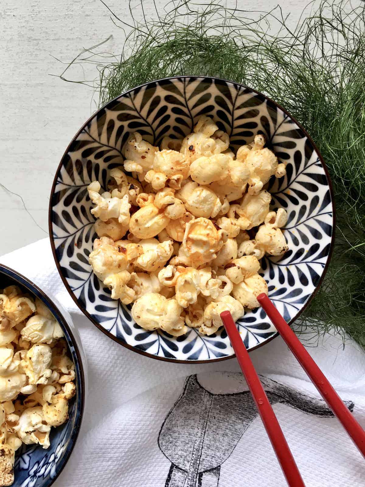 Easy spicy popcorn in a decorative bowl.