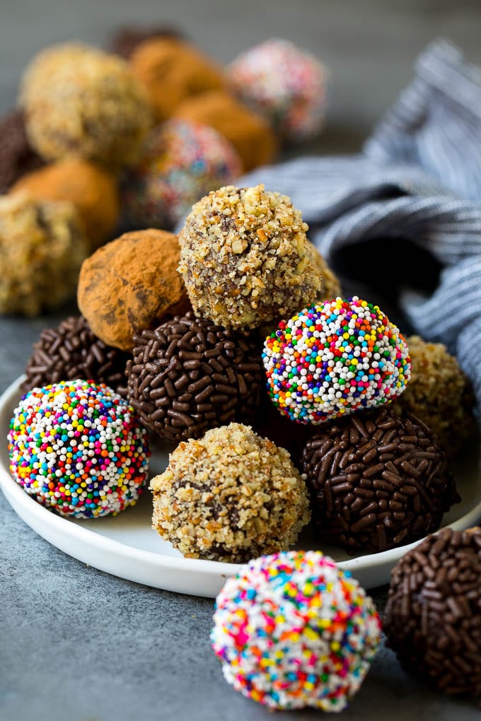 Stack of multi-colored chocolate ganache truffles.