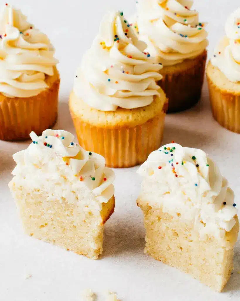 Image of multiple moist vanilla cupcakes.