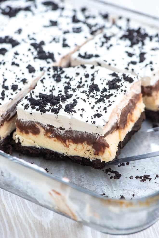 Buster bar ice cream sandwich in a glass dish.