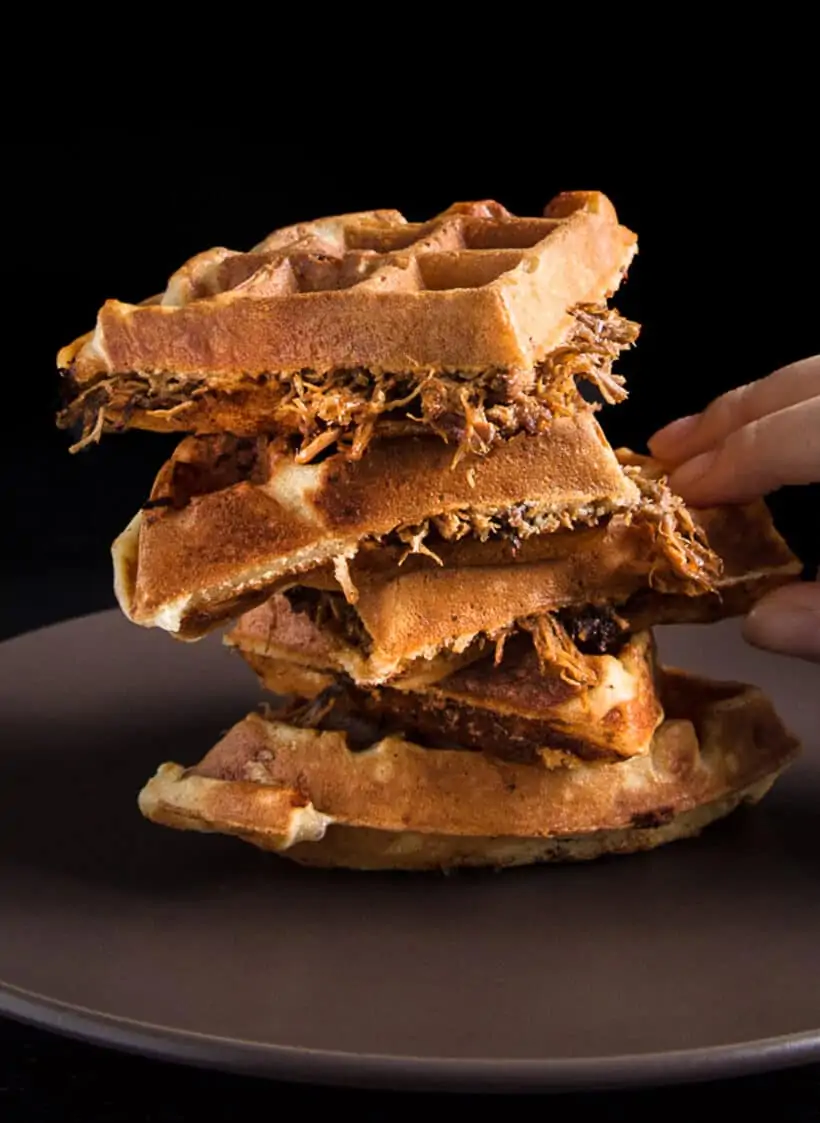 Stack of bbq pulled pork waffles.