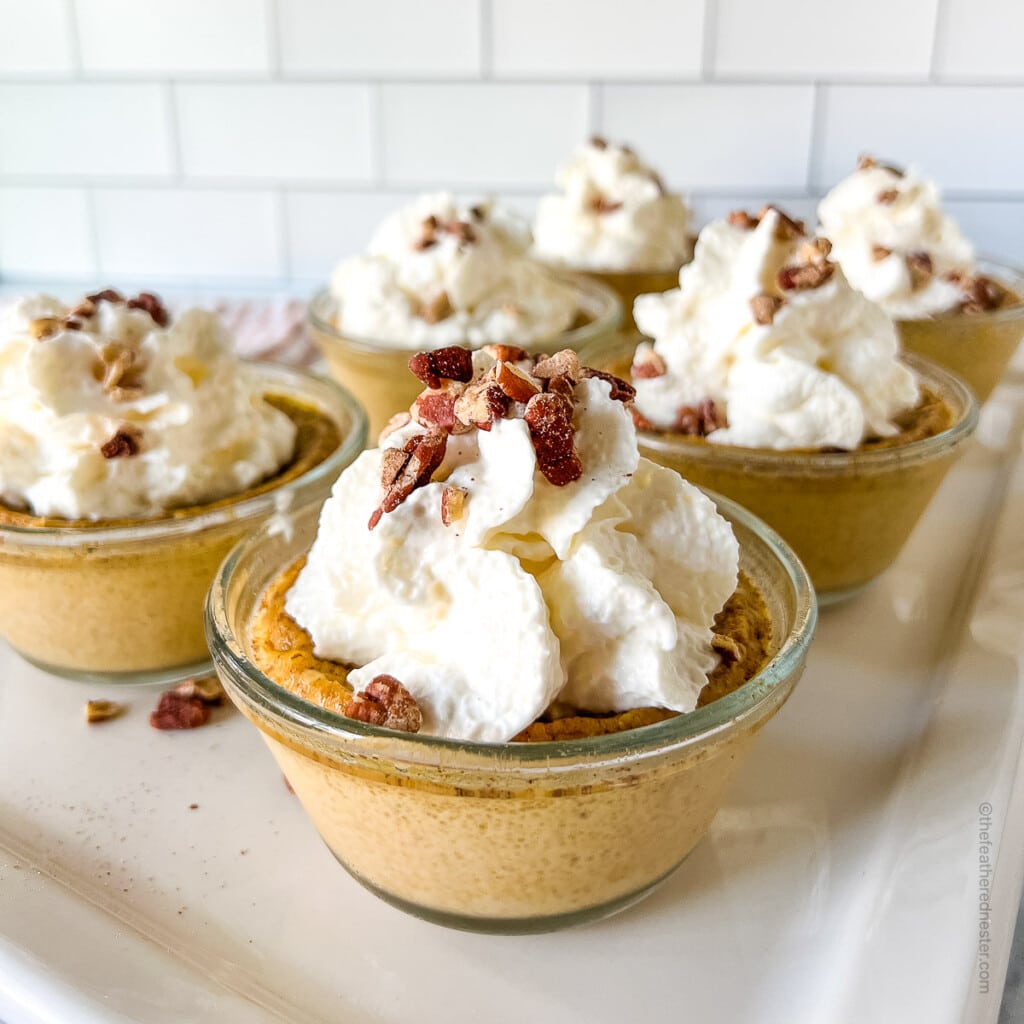 Pumpkin custard in dessert glasses.