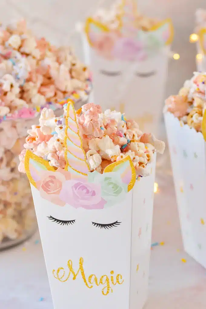 Unicorn popcorn in decorative unicorn popcorn bags.