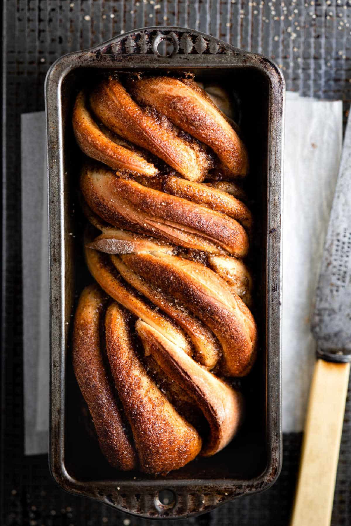 Cinnamon twist bread in a loaf pan.