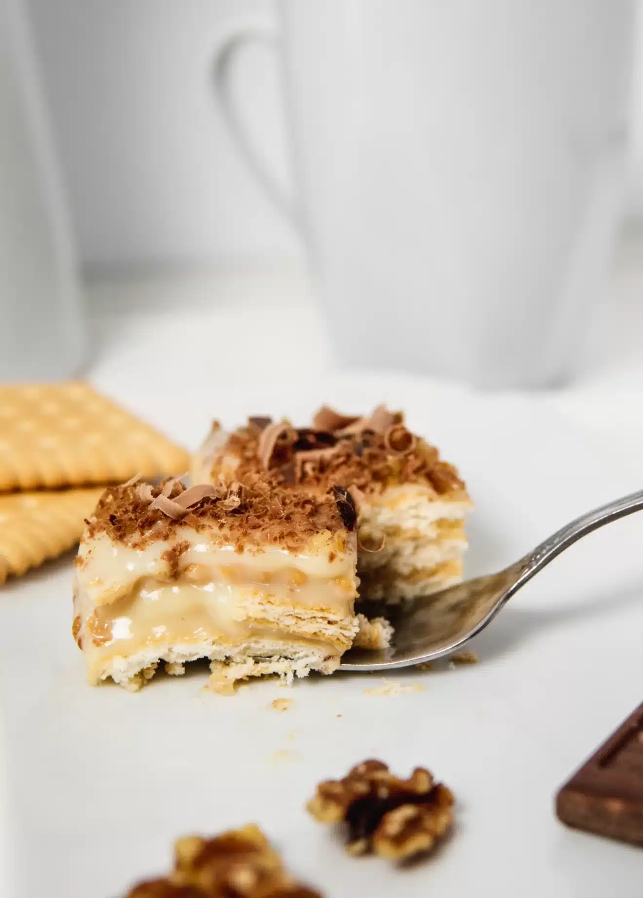 Forkful of layered Bulgarian biscuit cake.