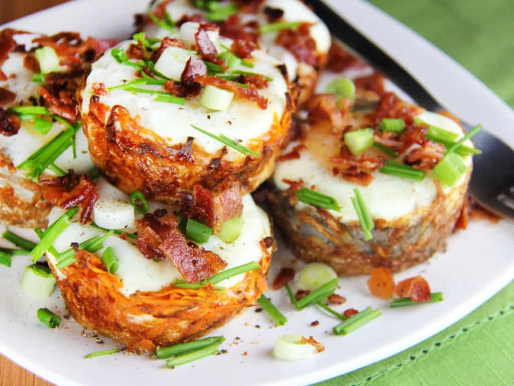 Platter of sweet potato hash and egg breakfast cups.