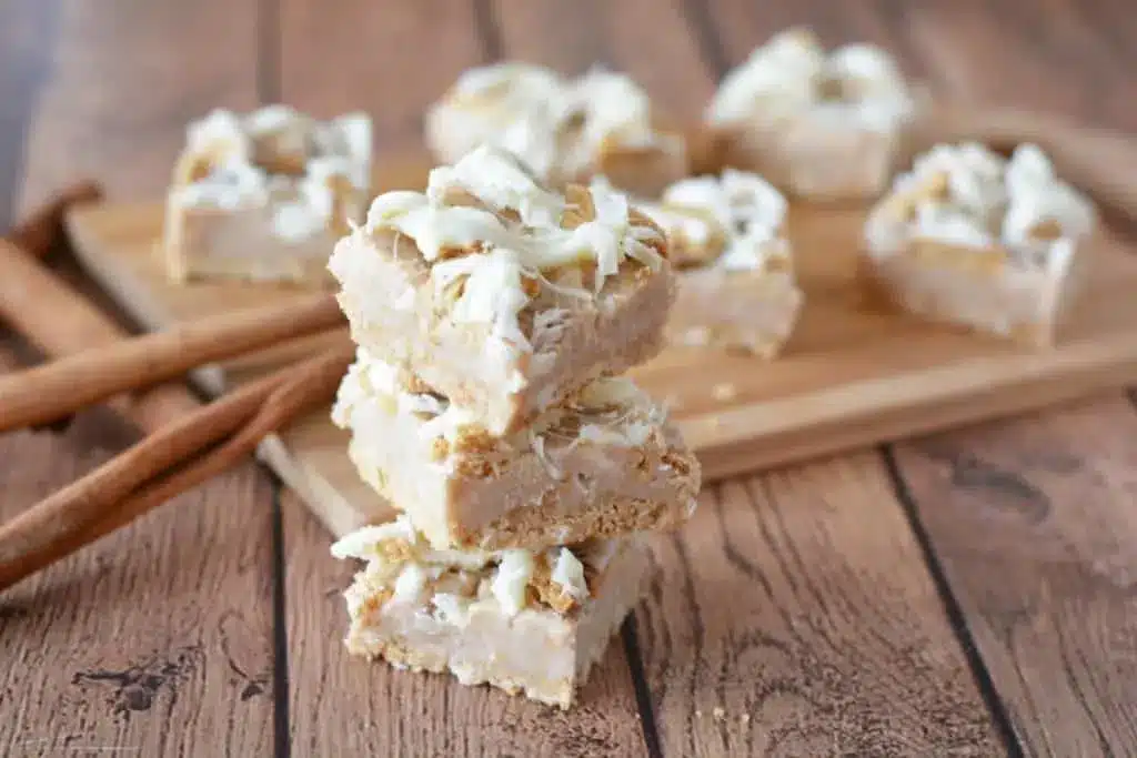 Stack of easy cinnamon roll cookie bars.