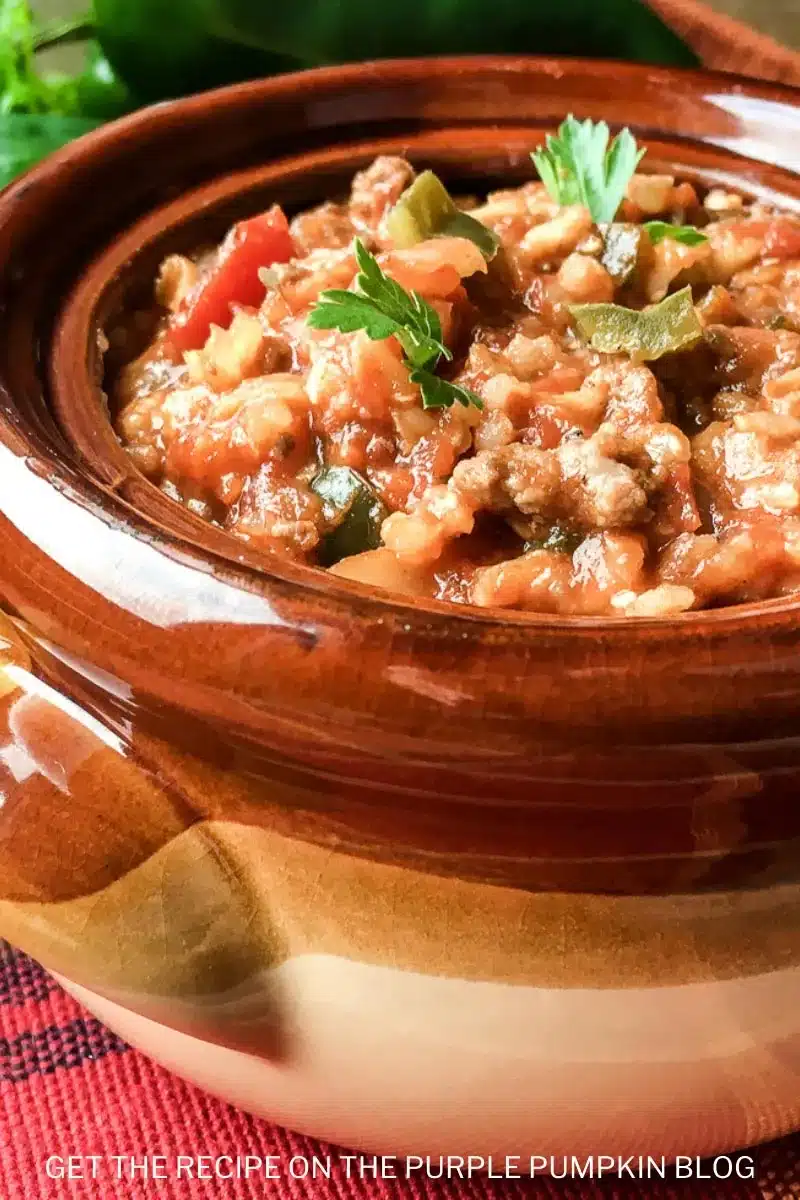 Stuffed poblano pepper soup in a bowl.