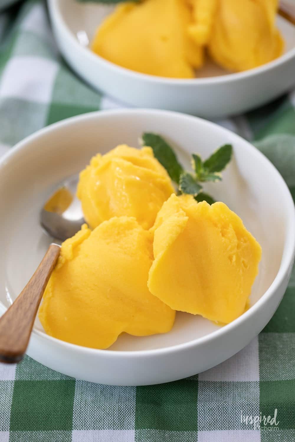 No churn mango sorbet in a white bowl.