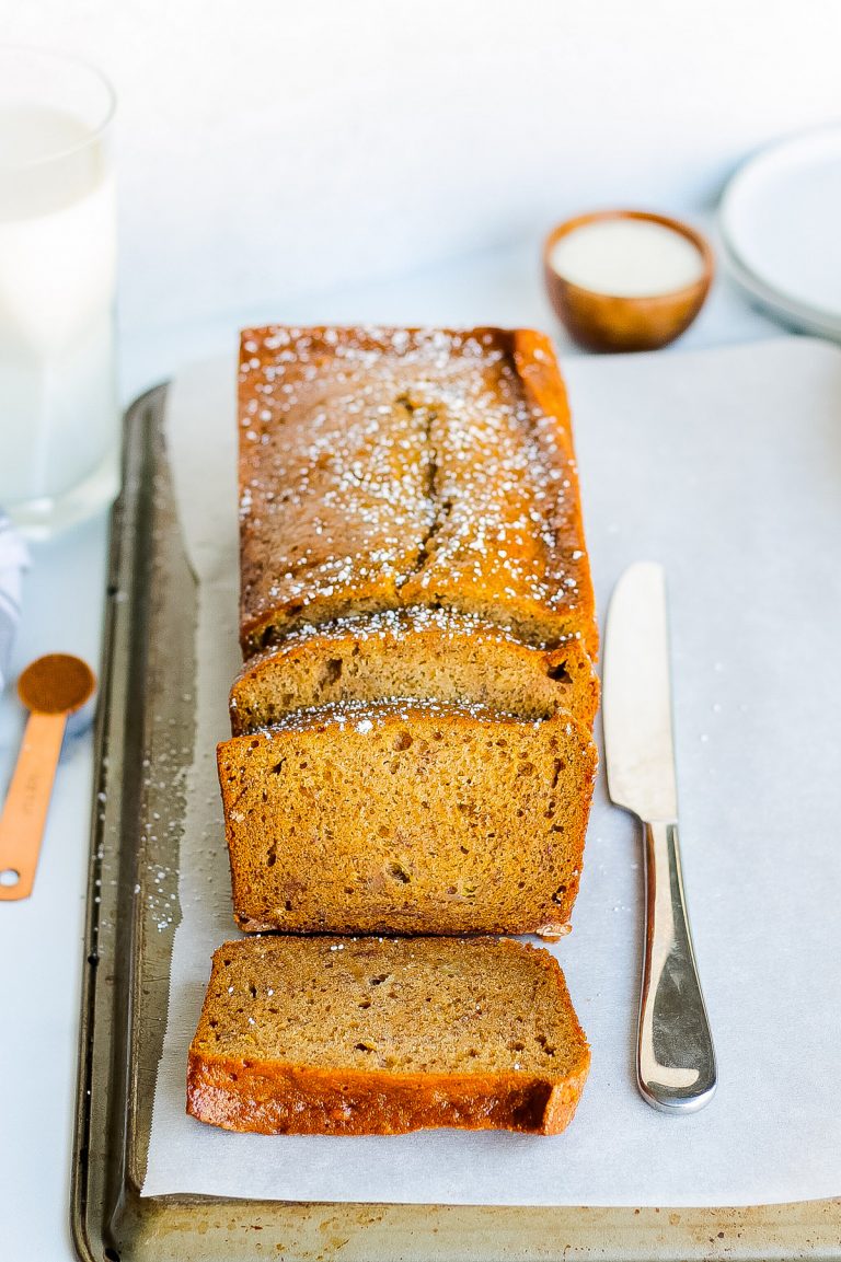 Cinnamon banana bread on a parchment lined cookie sheet.