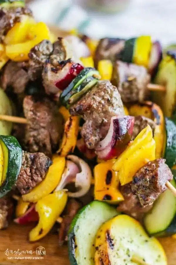 Stack of garlic pepper steak kabobs.