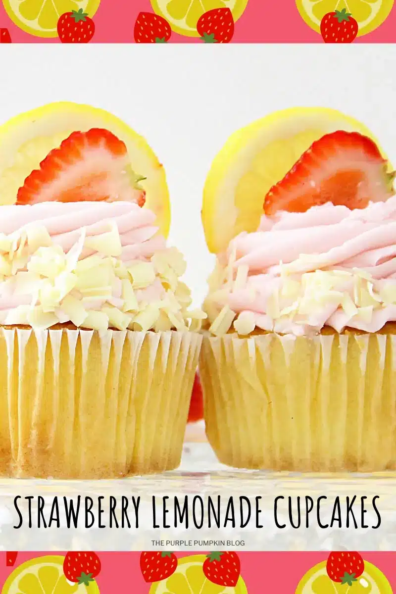 Two strawberry lemonade cupcakes with lemon slice and strawberry slices.