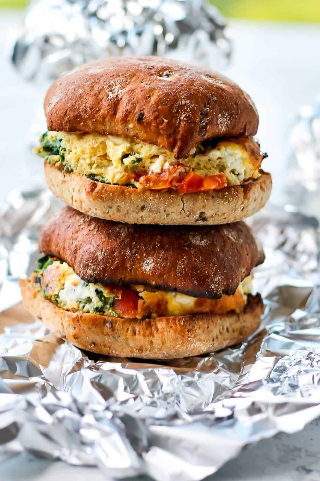 Stack of vegetarian breakfast sandwiches.