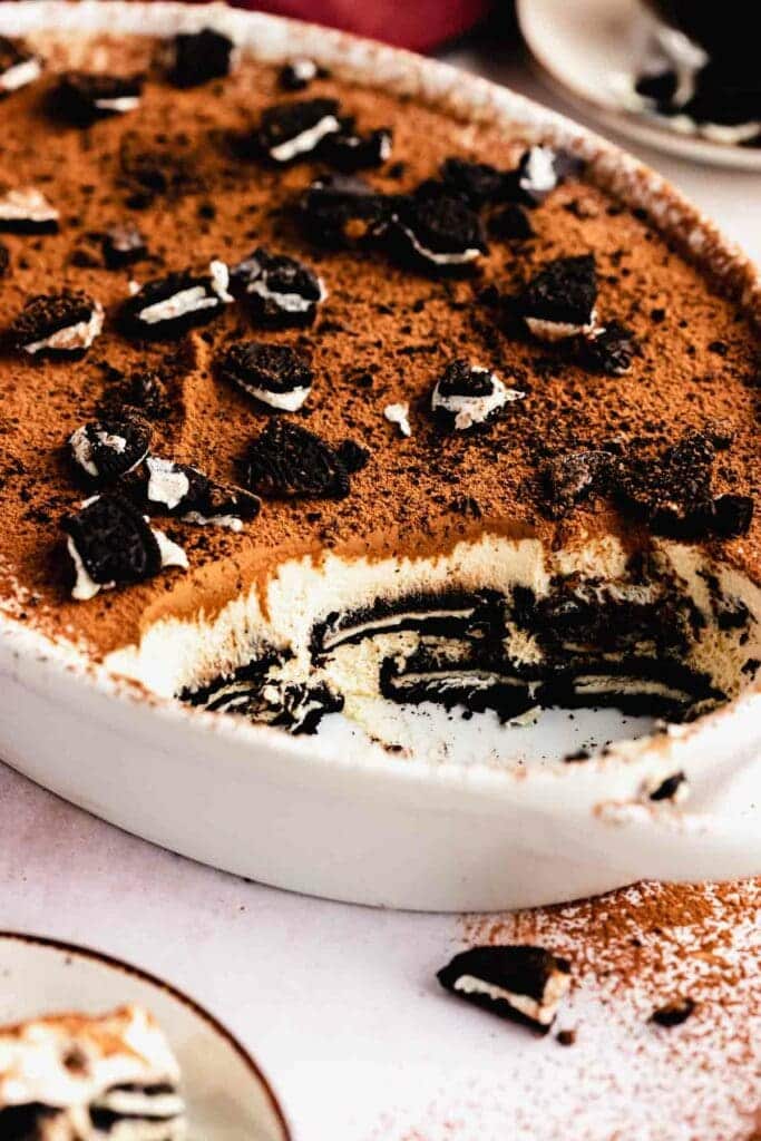 Oreo tiramisu in a white dish.