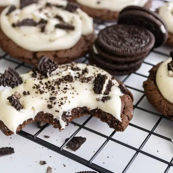 Oreo cheesecake cookies on a cooling rack.