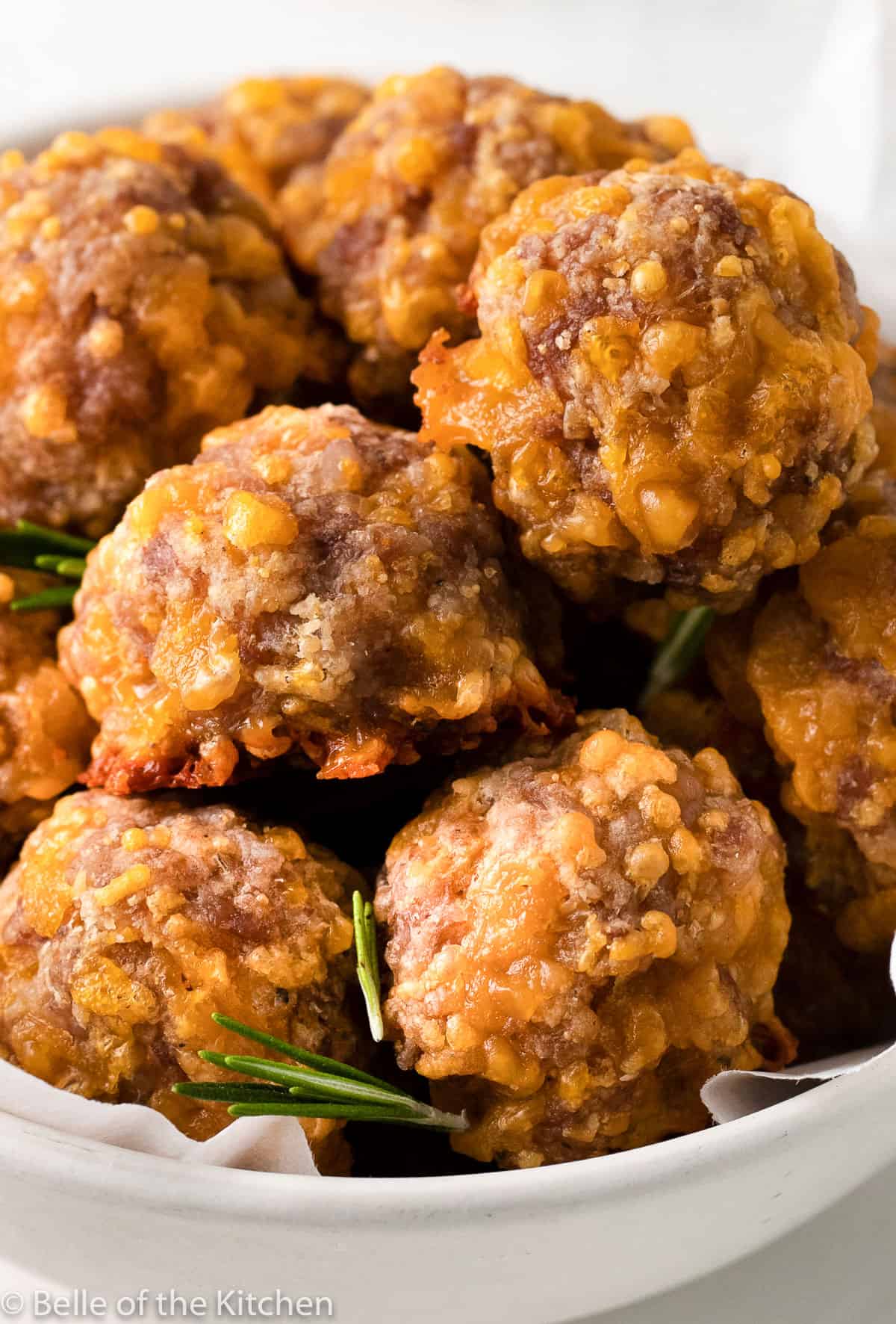 A bunch Bisquick sausage balls in a bowl.