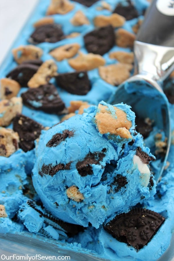 Blue Cookie Monster ice cream loaded with pieces of sandwich cookies and chocolate chip cookies.