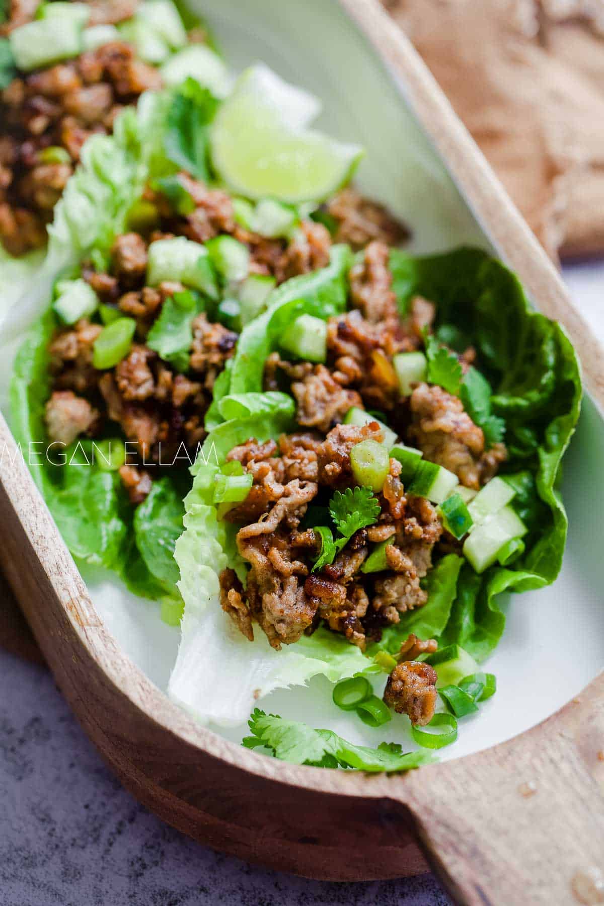 Easy san choy bow on a wooden platter.