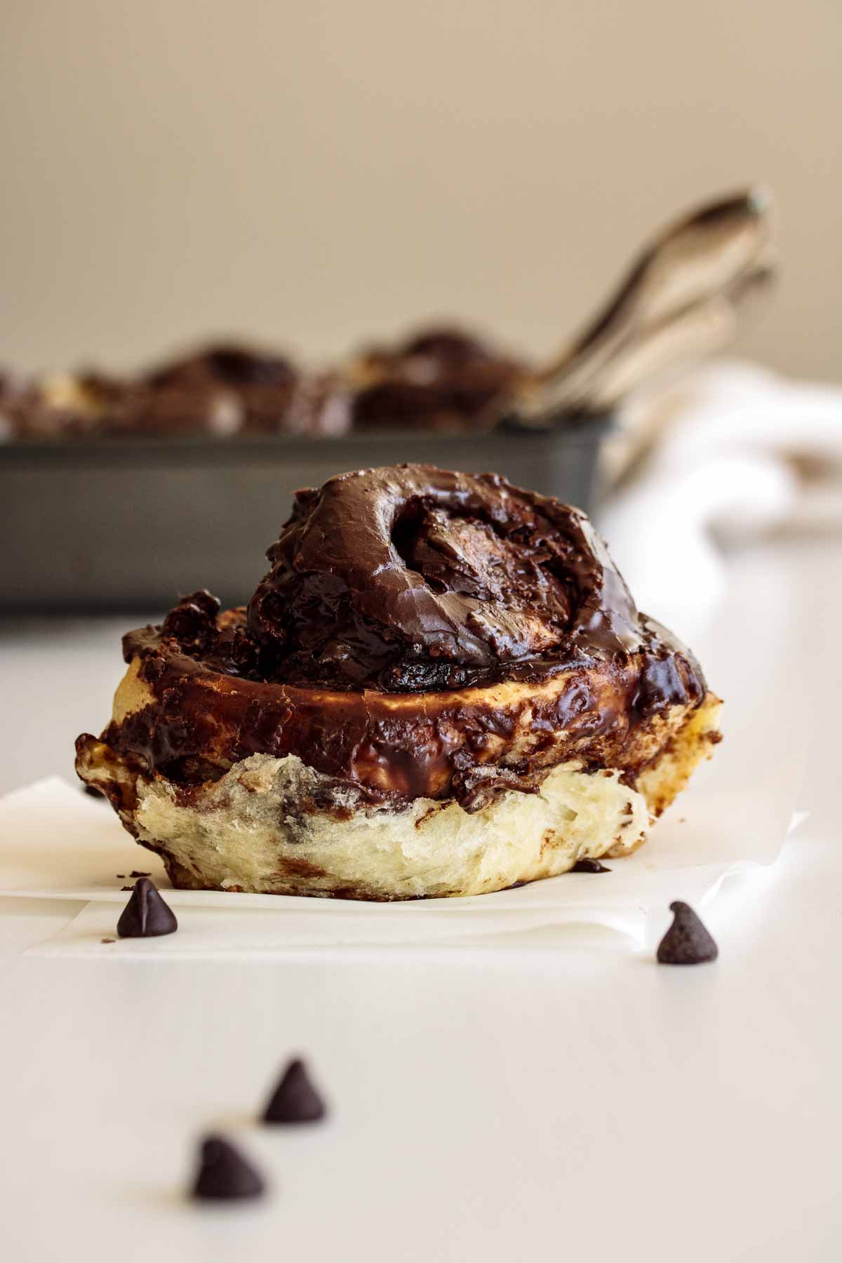 Chocolate rolls on a piece of parchment paper.