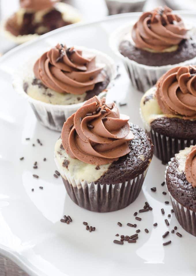 Platter of black bottom cupcakes with salted chocolate buttercream.