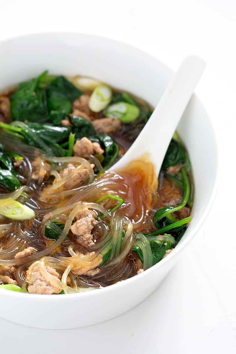 Glass noodle soup in a bowl.