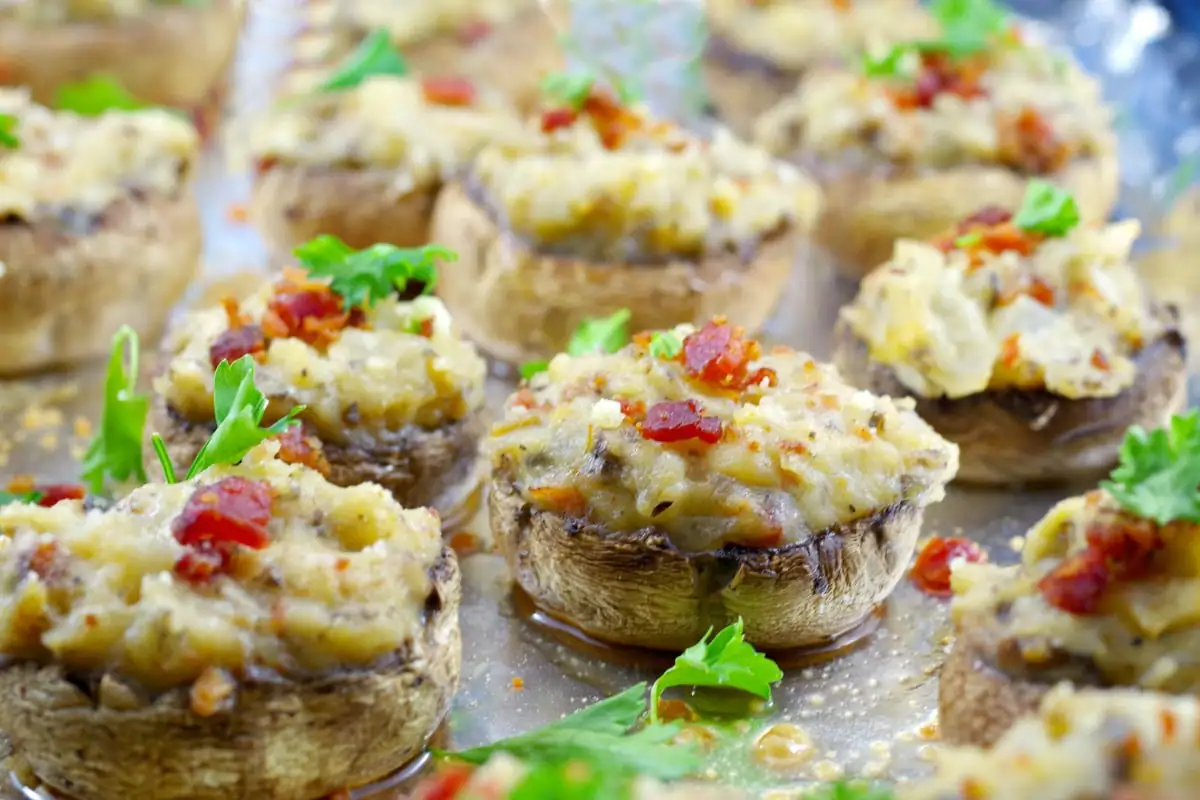 Easy pierogi stuffed mushrooms on a aluminum foil lined cookie sheet.