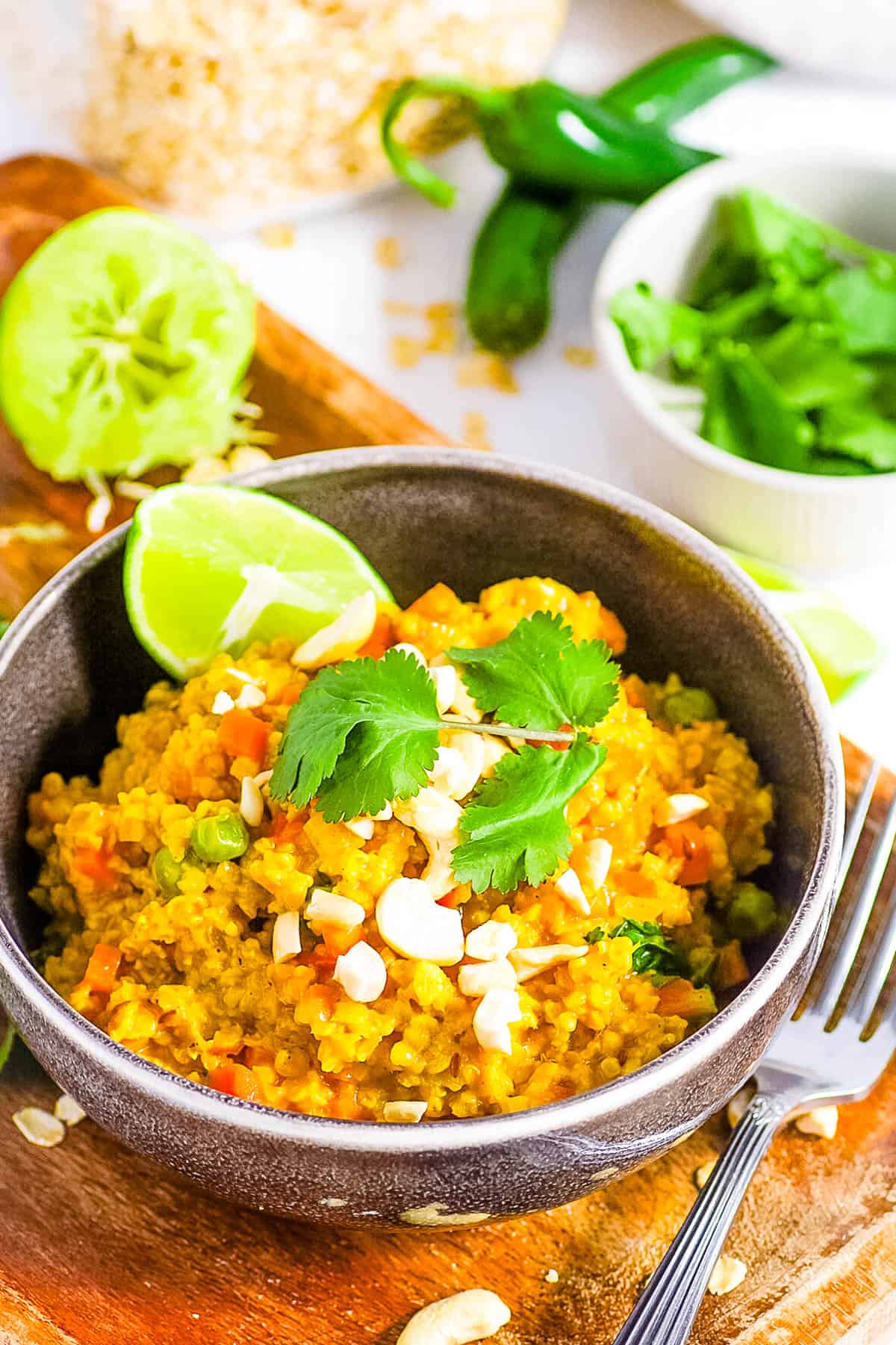 Masala oats with cilantro and lime in a bowl.