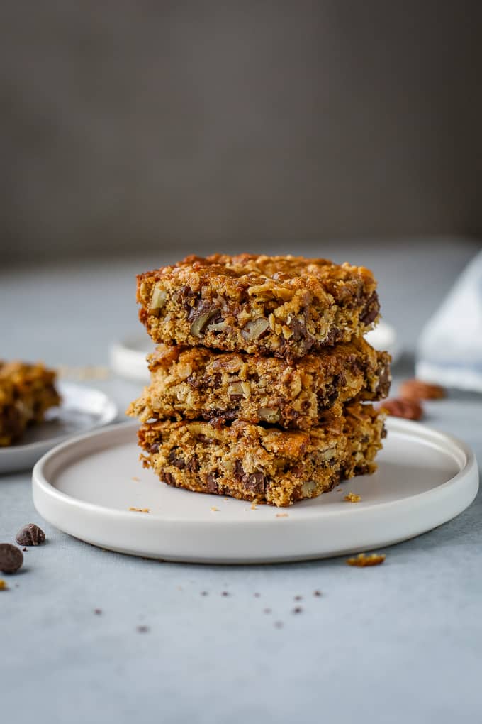 Stack of chocolate chip pecan bars.