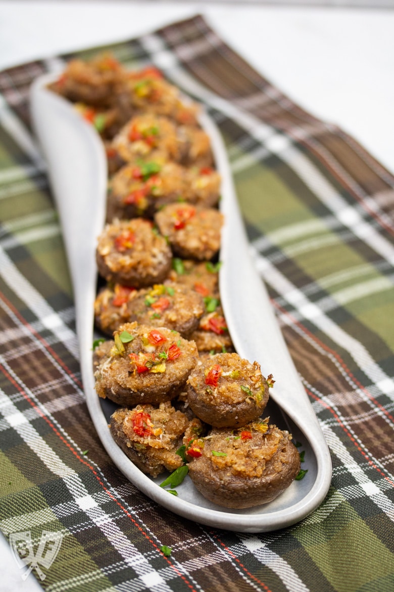 Settino's Italian stuffed mushrooms on a decorative serving plate.