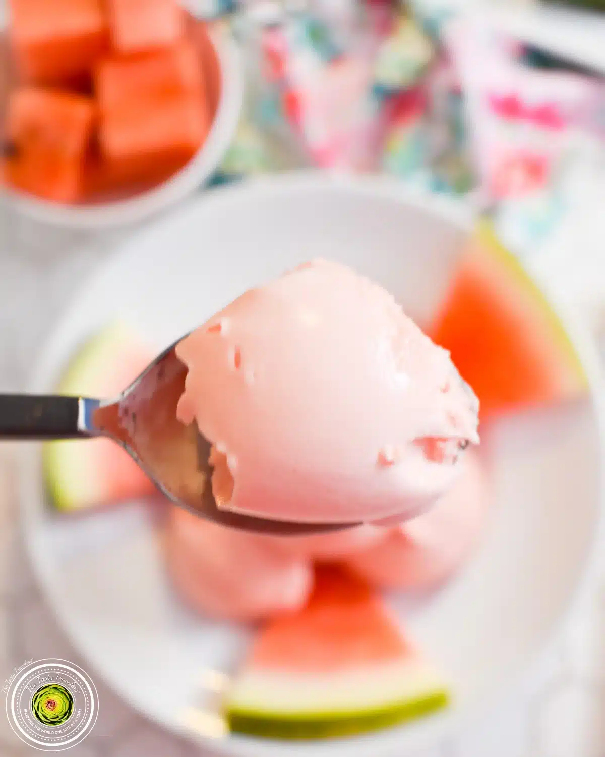Spoonful of pink watermelon sherbet.