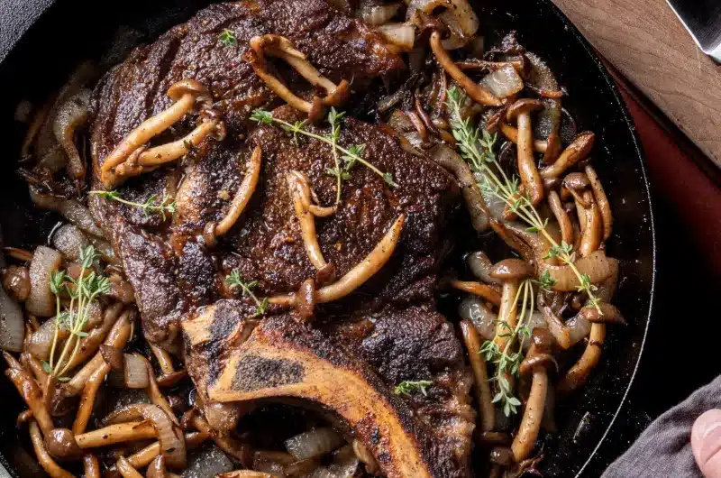 Ribeye msuhroom and onion skillet in a cast iron pan.