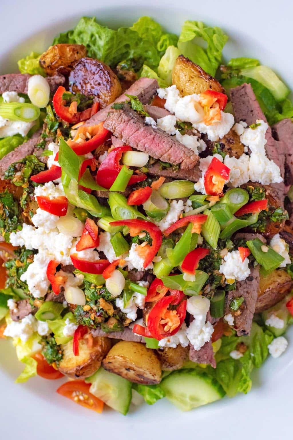 Spicy steak salad in a bowl.