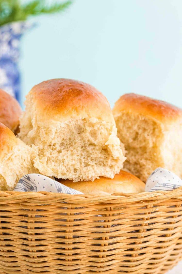 Basket full of sourdough discard dinner rolls.