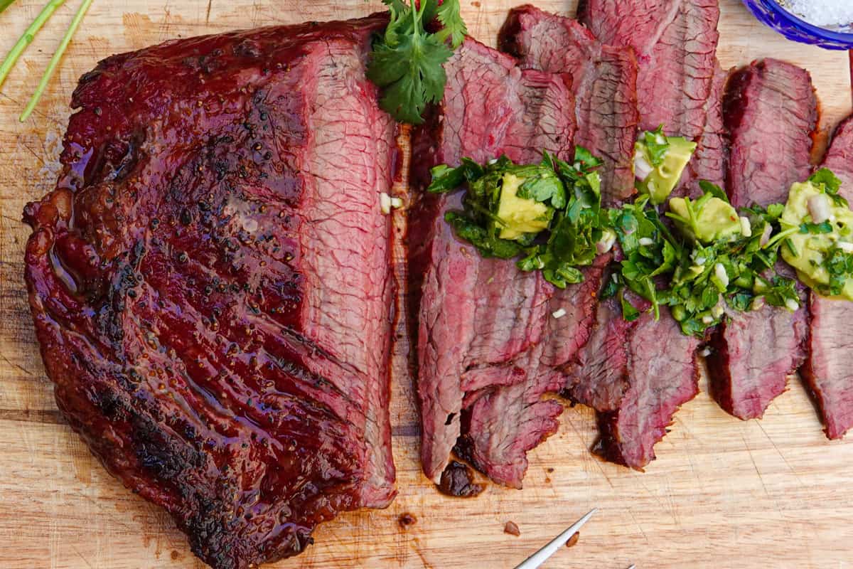 Smoked flank steak with green chutney.