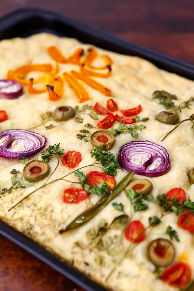 Vegan focaccia in a baking tray.