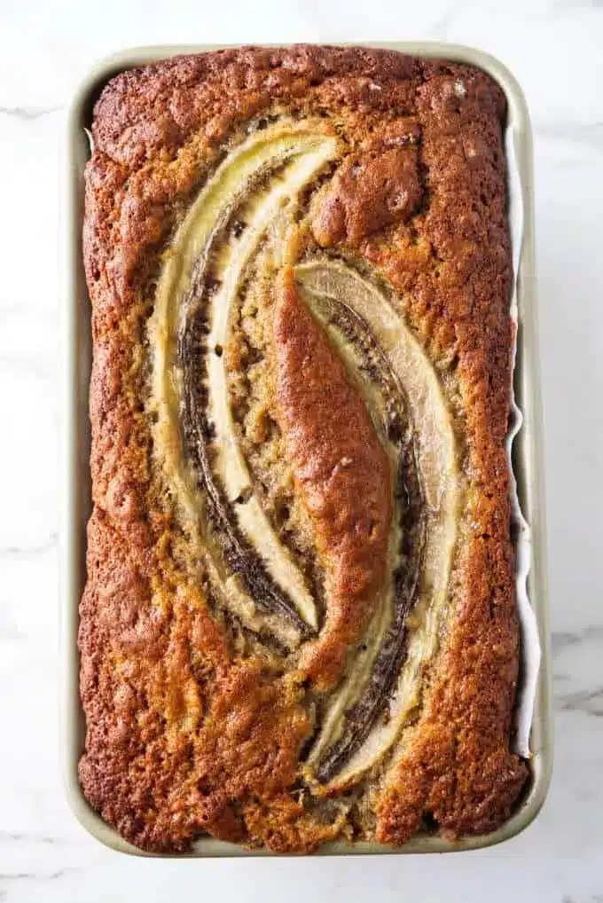 Sourdough banana bread in a baking pan.