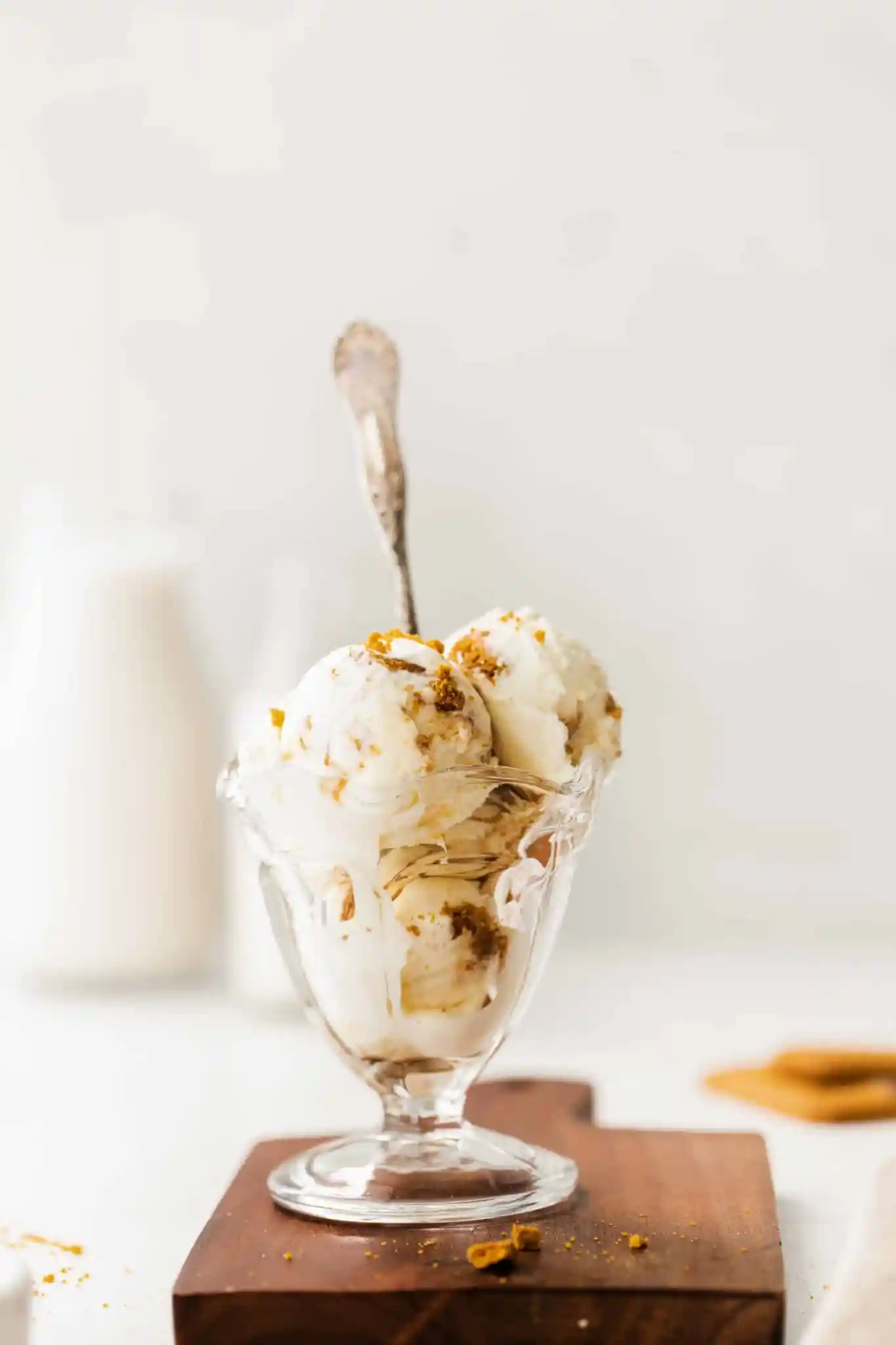 Bowl full of cookie butter ice cream with a spoon.